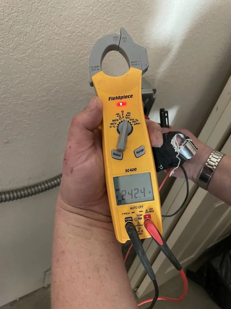 Voltage testing with clamp meter during Aluminum Wiring Replacement in Monroe